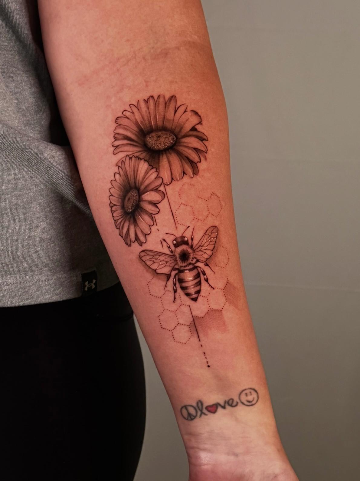 black and gray tattoo. fine line tattoo. book tattoo. floral flower tattoo.